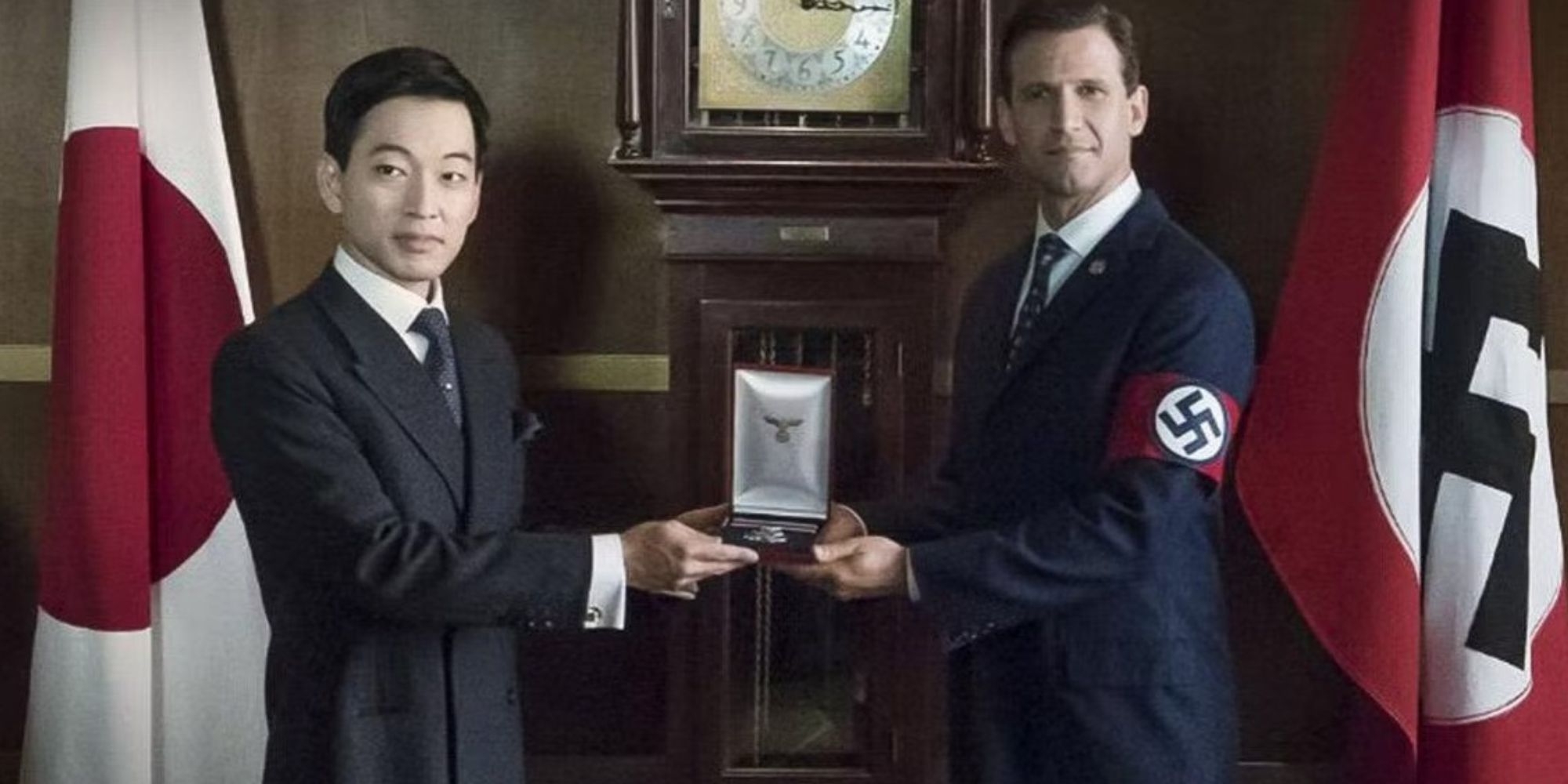 An Asian man and a Nazi pose together in The Man In The High Castle