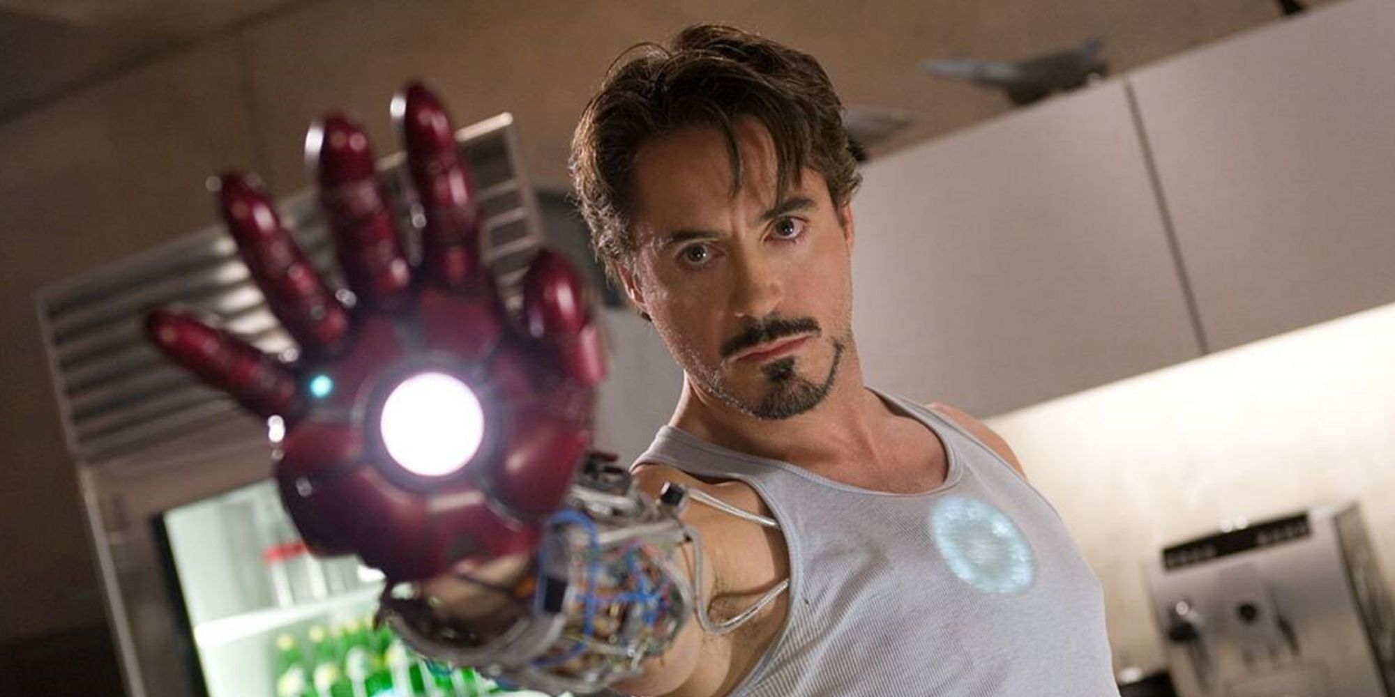 Tony Stark (Robert Downey Jr.) aims for a repulsor blast in 'Iron Man' (2008)