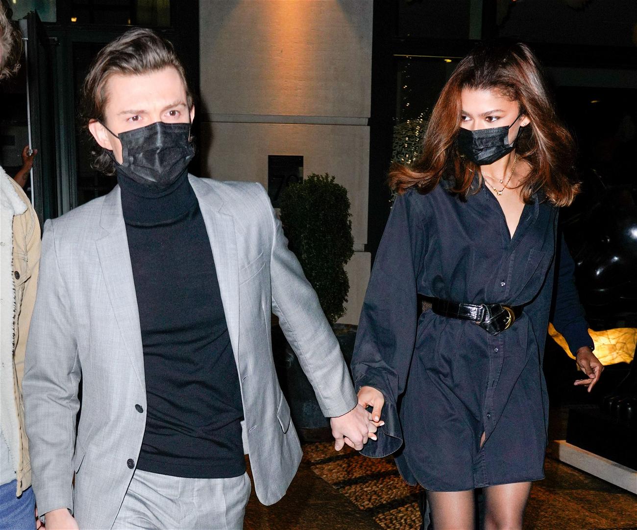 Tom Holland and Zendaya hold hands as they leave their hotel in New York